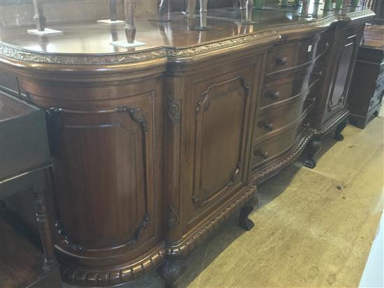 Large George III style mahogany shaped front sideboard, 9ft 6in.